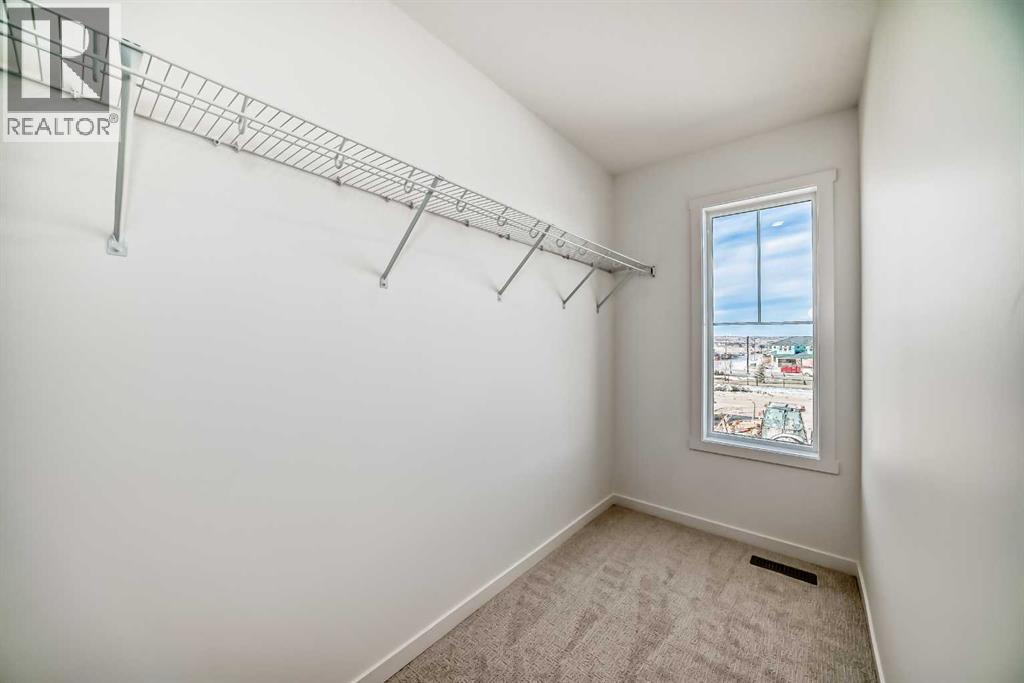 81 Southborough Square, Cochrane, Alberta  T4C 3J7 - Photo 31 - A2260500