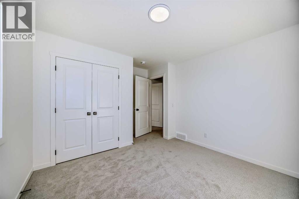 81 Southborough Square, Cochrane, Alberta  T4C 3J7 - Photo 33 - A2260500