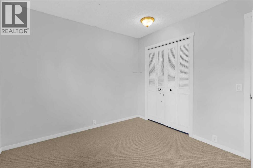 968 Bracewood Rise Sw, Calgary, Alberta  T2W 3C9 - Photo 16 - A2268511