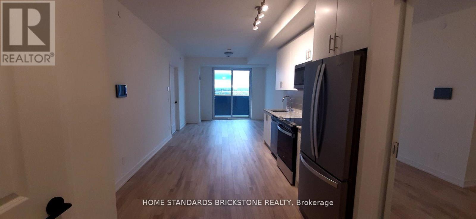 712 - 335 Wheat Boom Drive, Oakville, Ontario  L6H 7Y1 - Photo 2 - W12503564