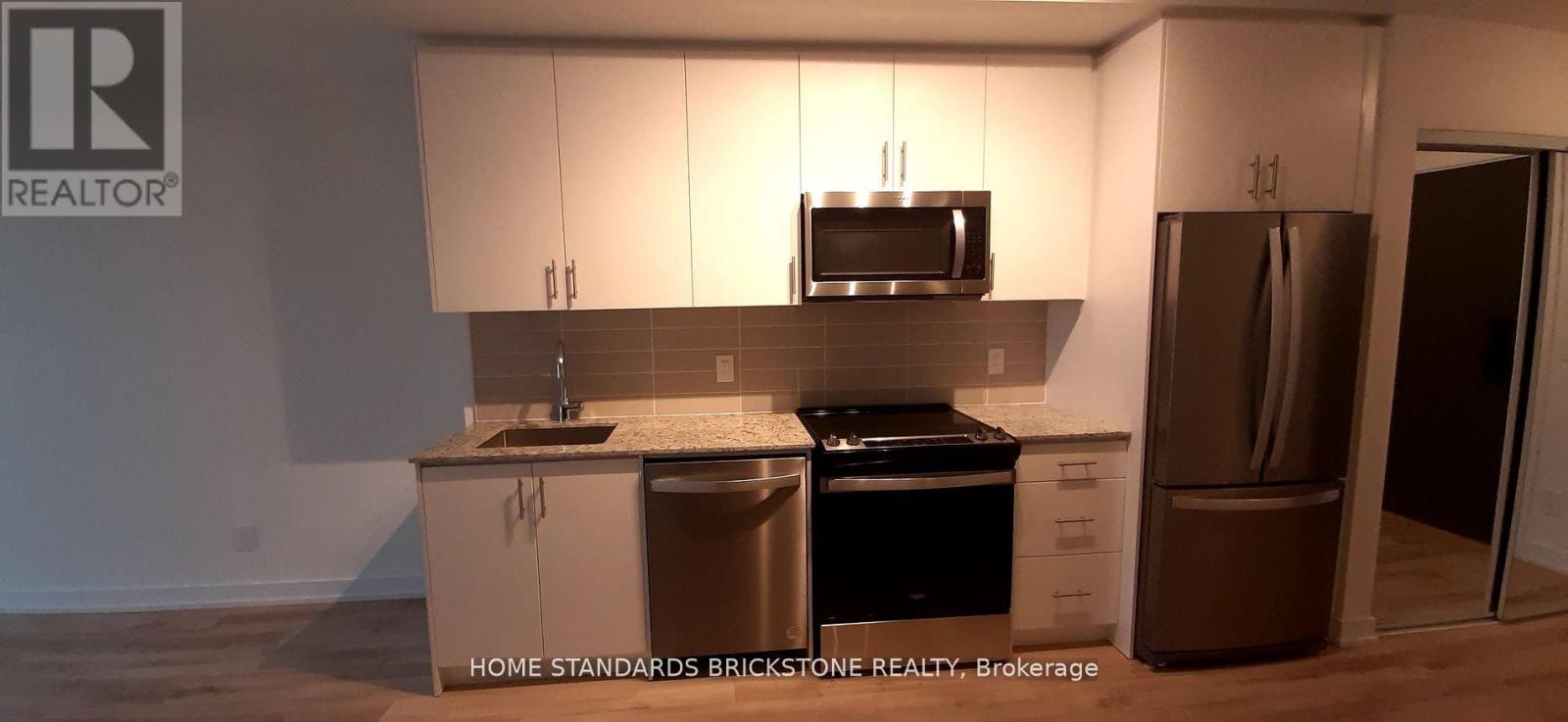 712 - 335 Wheat Boom Drive, Oakville, Ontario  L6H 7Y1 - Photo 5 - W12503564