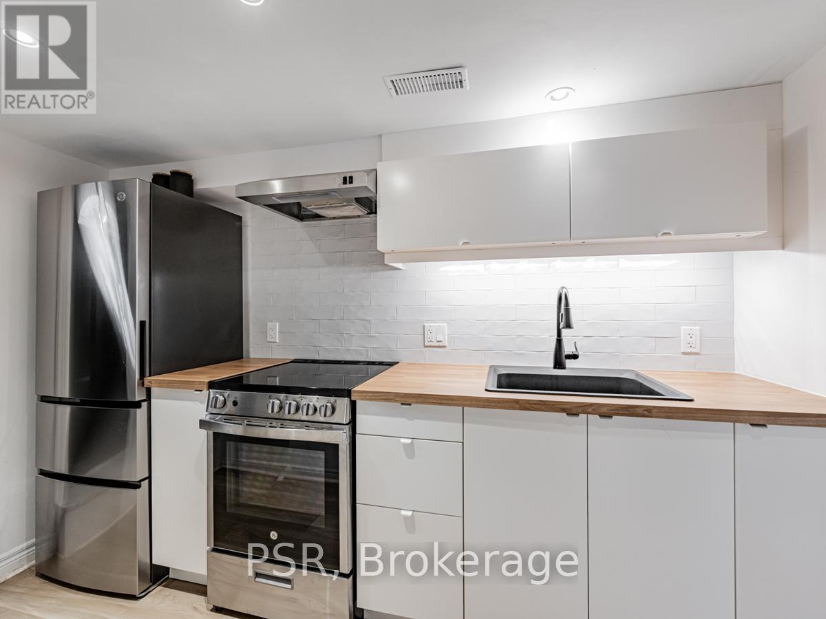 Lower - 371 Mcroberts Avenue, Toronto, Ontario  M6E 4R1 - Photo 8 - W12503578