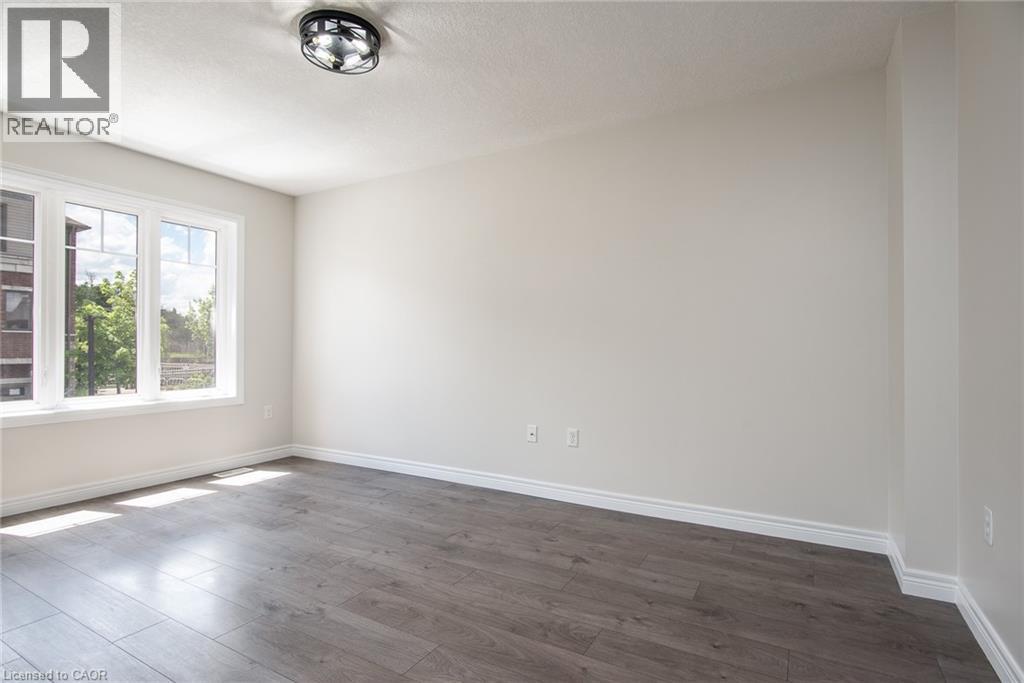 70 Willowrun Drive Unit# J-3, Kitchener, Ontario  N2A 0J3 - Photo 5 - 40784988