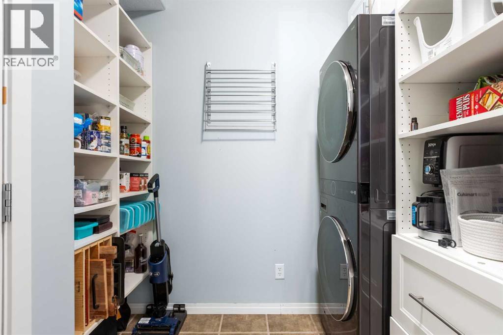 23 Collins Crescent, Crossfield, Alberta  T0M 0S0 - Photo 12 - A2264627