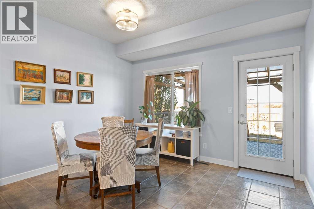 23 Collins Crescent, Crossfield, Alberta  T0M 0S0 - Photo 7 - A2264627