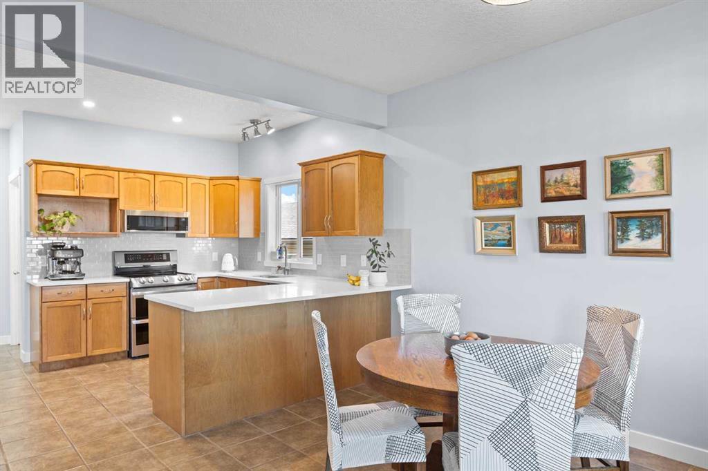 23 Collins Crescent, Crossfield, Alberta  T0M 0S0 - Photo 6 - A2264627