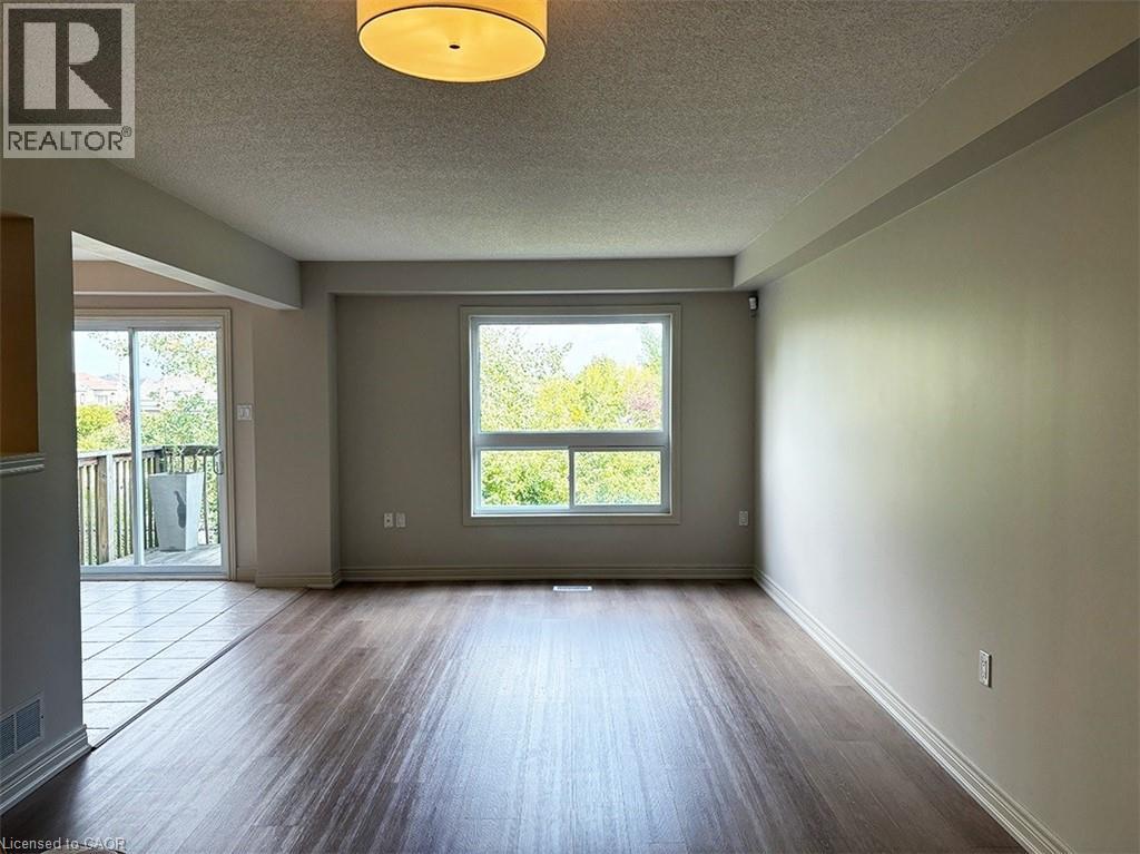 25 Ivybridge Beach Unit# 16, Stoney Creek, Ontario  L8E 0A5 - Photo 4 - 40785213