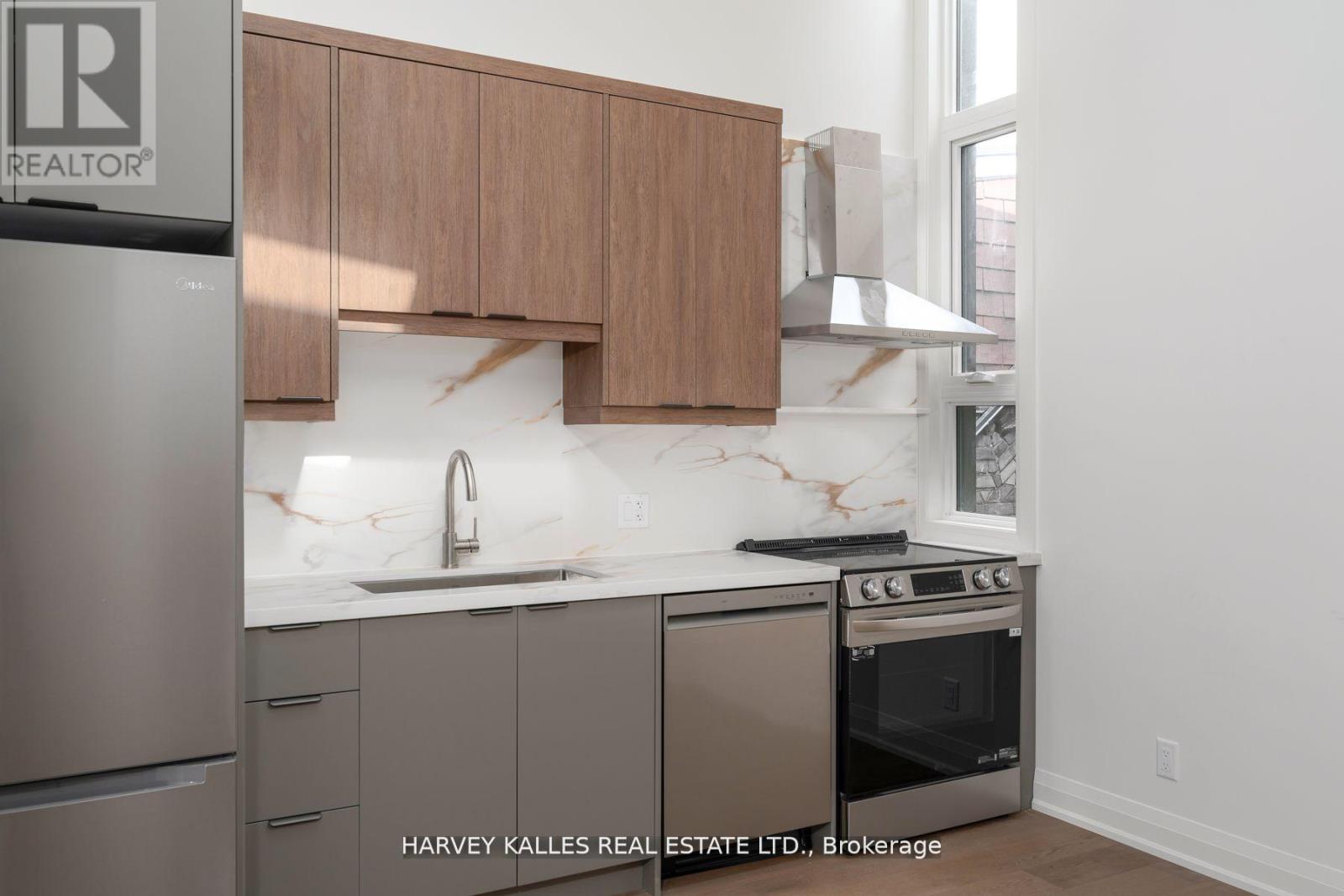 4 (3rd Floor) - 24 Sullivan Street, Toronto, Ontario  M5T 1B9 - Photo 3 - C12504074