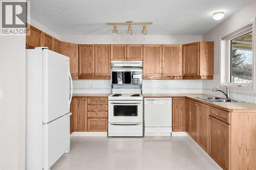 634 Sheep River Mews, Okotoks, Alberta  T1S 1S5 - Photo 8 - A2267612