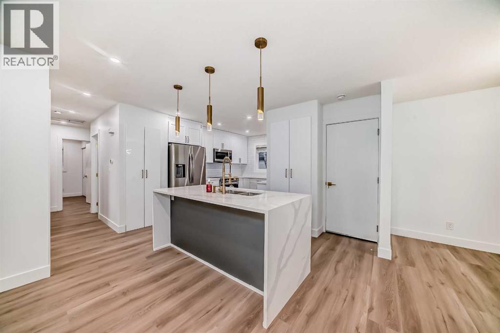 304 Huntbourne Hill Ne, Calgary, Alberta  T2K 3Y4 - Photo 7 - A2241095