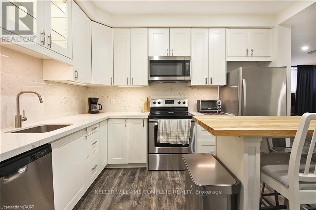 Lower - 23 Scarletwood Street, Hamilton, Ontario  L8J 0K8 - Photo 6 - X12503910