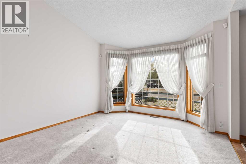 97 Downey Road, Okotoks, Alberta  T1S 1N9 - Photo 3 - A2268185