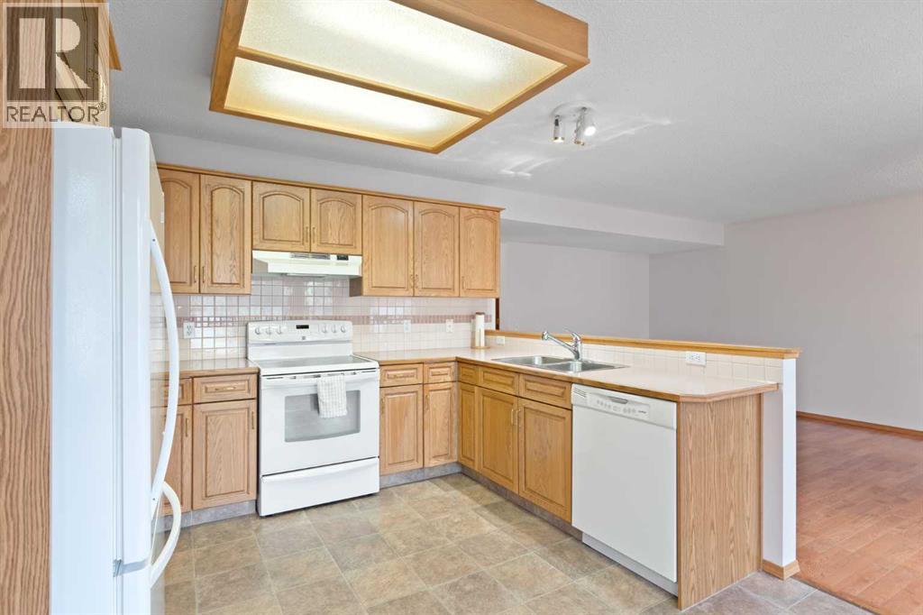 97 Downey Road, Okotoks, Alberta  T1S 1N9 - Photo 7 - A2268185