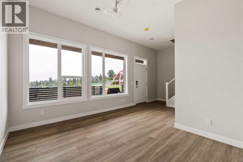 417 Sovereign Common Sw, Calgary, Alberta  T3C 3Y3 - Photo 3 - A2266257