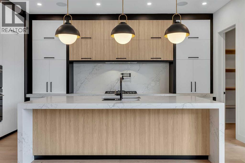 342 Normandy Drive Sw, Calgary, Alberta  T3E 8G8 - Photo 5 - A2266611