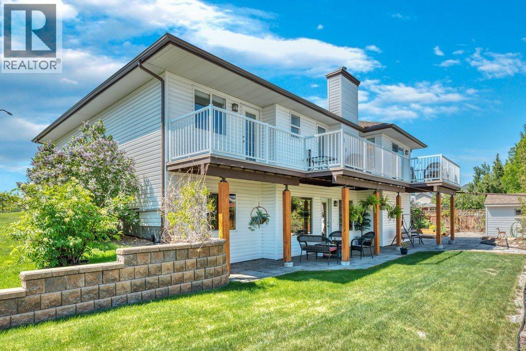 15 Henderson Bay Ne, Langdon, Alberta  T1X 2V6 - Photo 1 - A2263078