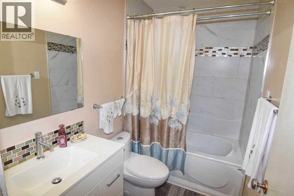 1140 Trafford Drive Nw, Calgary, Alberta  T2K 2T8 - Photo 14 - A2265216