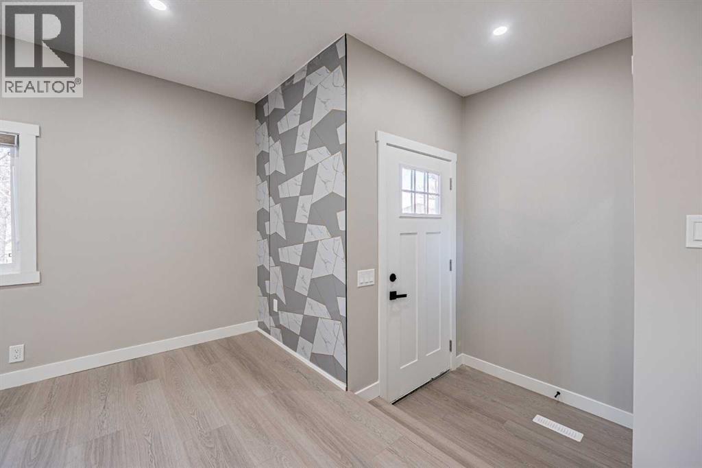 8428 Berkley Road Nw, Calgary, Alberta  T3K 1B4 - Photo 4 - A2268437