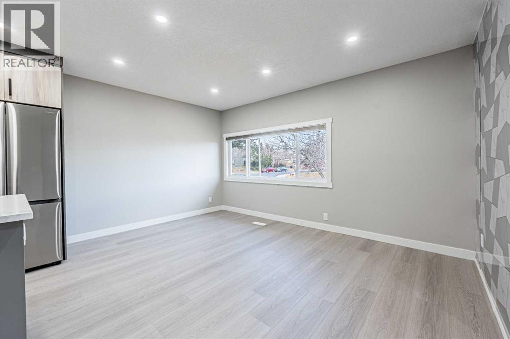 8428 Berkley Road Nw, Calgary, Alberta  T3K 1B4 - Photo 10 - A2268437