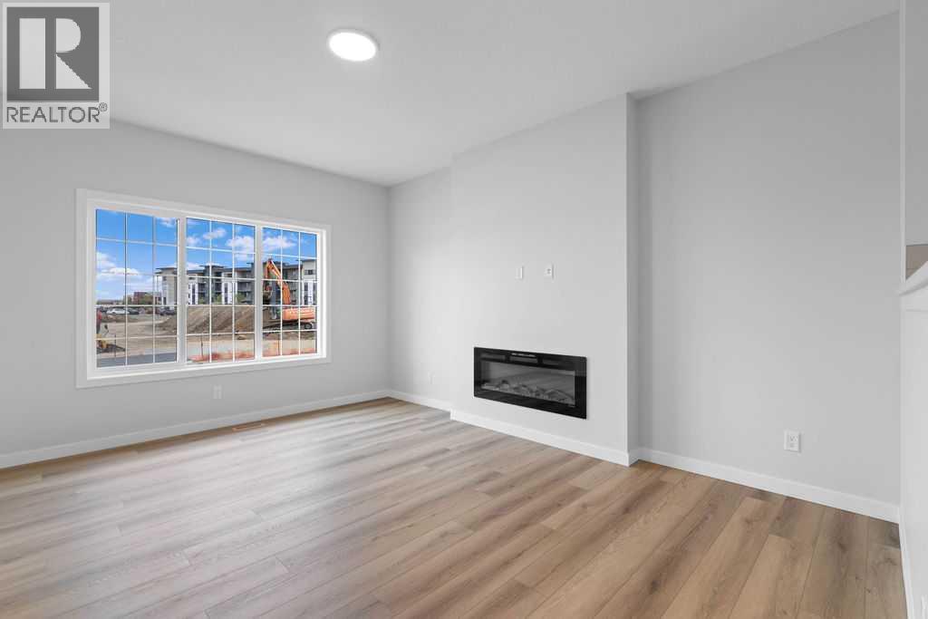 1025 Reynolds Crescent Sw, Airdrie, Alberta  T4B 5L8 - Photo 5 - A2199712