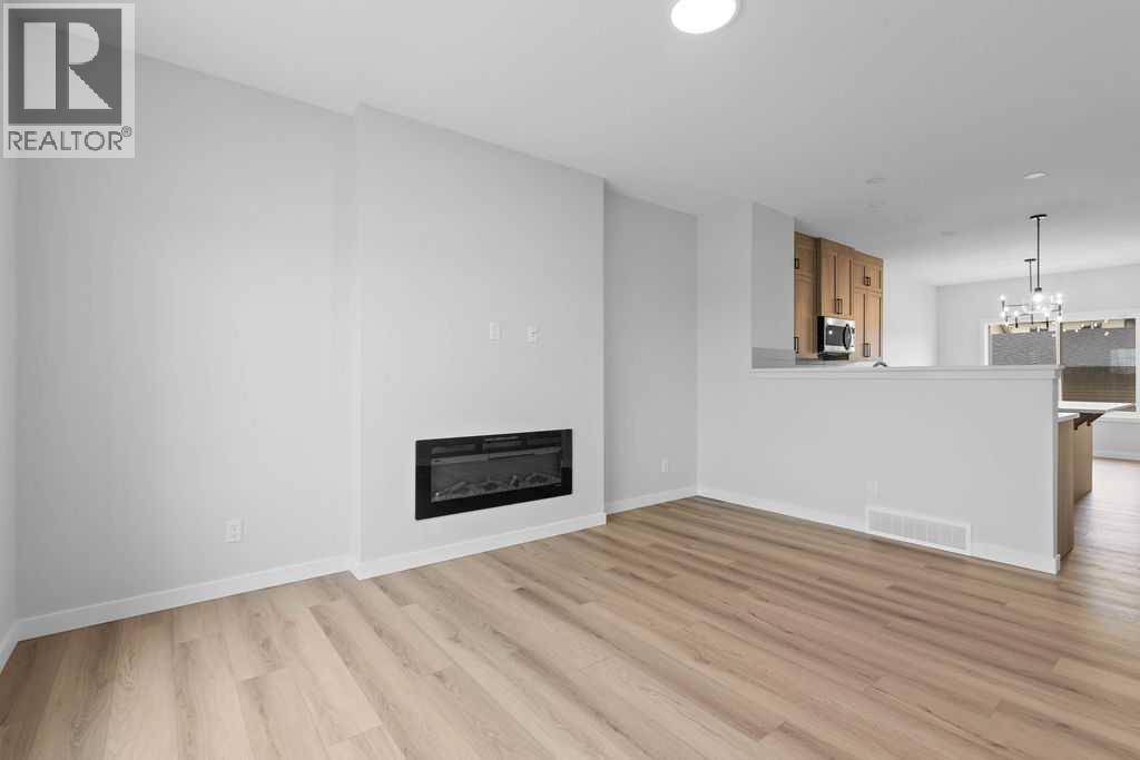 1025 Reynolds Crescent Sw, Airdrie, Alberta  T4B 5L8 - Photo 6 - A2199712