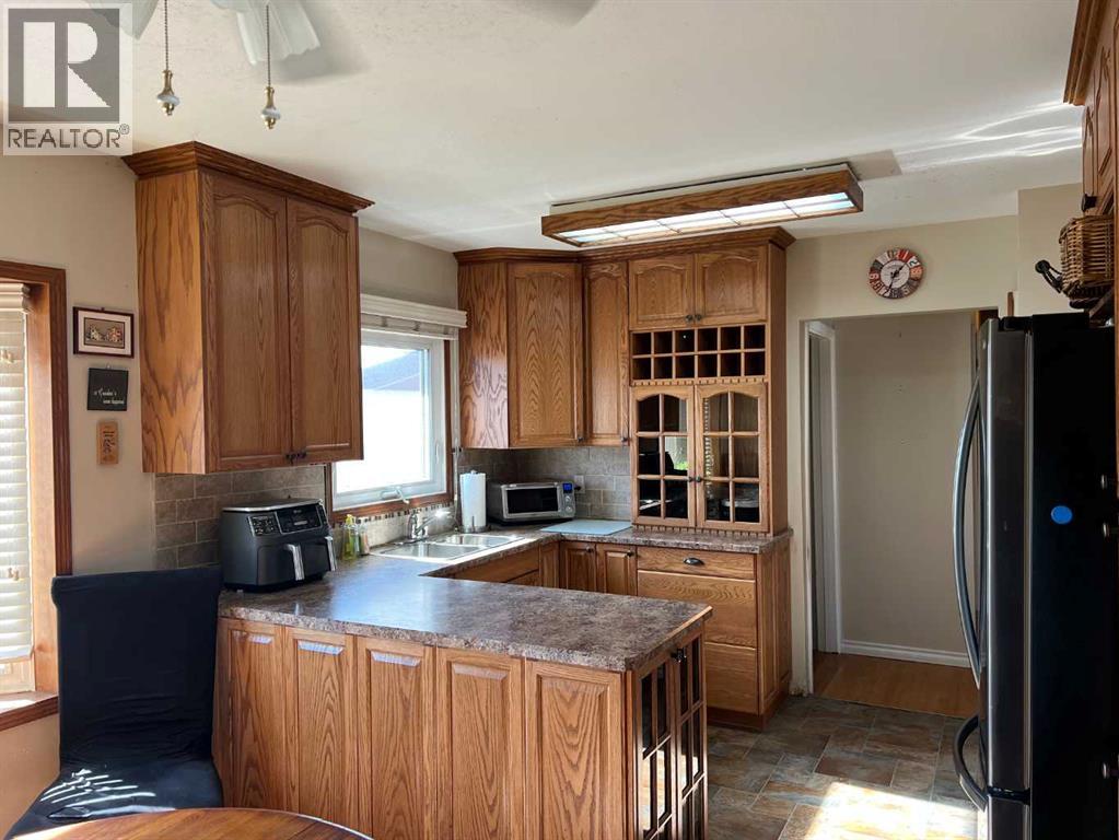 4611 Fortune Road Se, Calgary, Alberta  T2A 2A7 - Photo 8 - A2263158