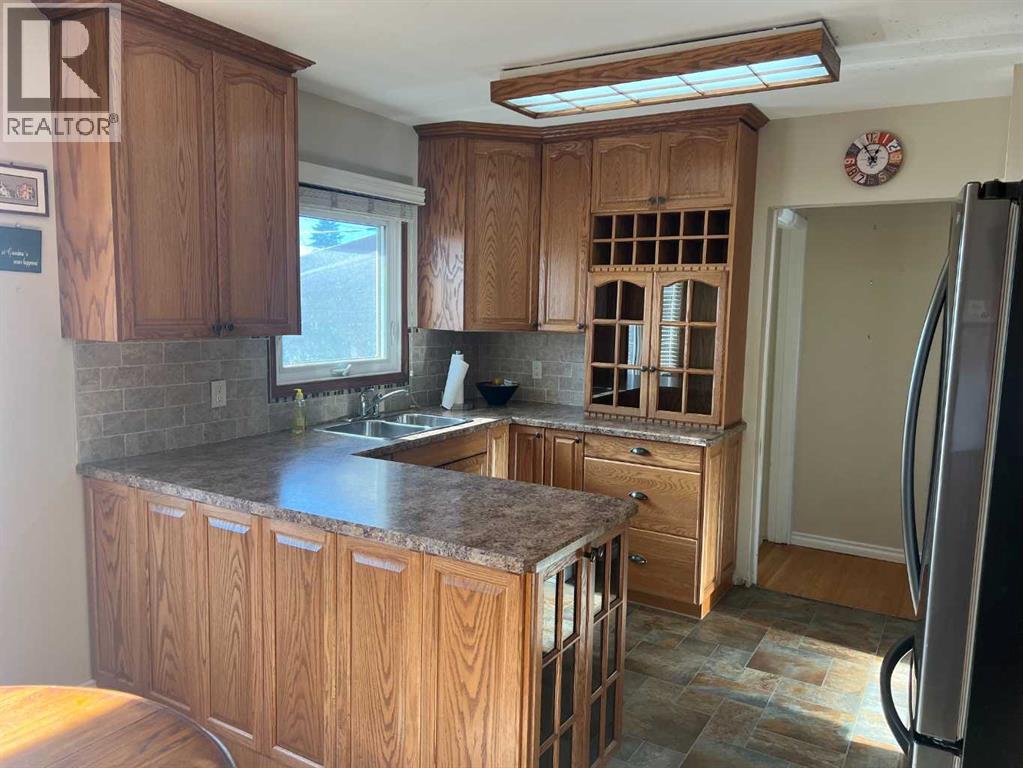 4611 Fortune Road Se, Calgary, Alberta  T2A 2A7 - Photo 7 - A2263158