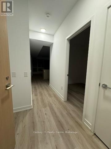 309 - 395 Square One Drive, Mississauga, Ontario  L5B 0P6 - Photo 2 - W12504746