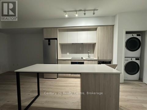 309 - 395 Square One Drive, Mississauga, Ontario  L5B 0P6 - Photo 6 - W12504746