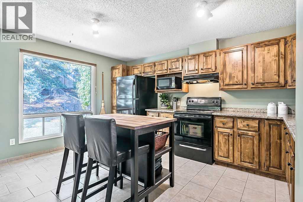 637 Strathcona Drive Sw, Calgary, Alberta  T3H 1K6 - Photo 7 - A2263882