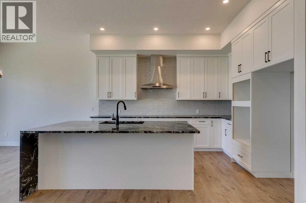 56 Dawson Wharf Mount, Chestermere, Alberta  T1X 2X5 - Photo 7 - A2264717