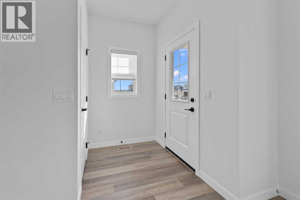 994 Chinook Winds Meadow Sw, Airdrie, Alberta  T4B 5R1 - Photo 4 - A2265507