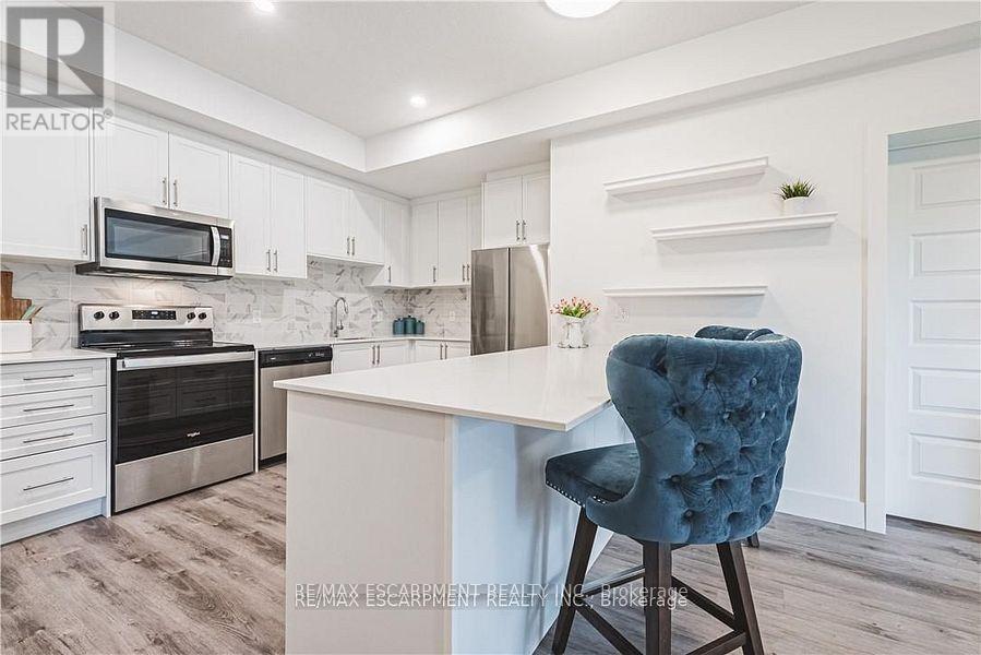 310 - 1201 Lackner Place, Kitchener, Ontario  N2A 0L4 - Photo 5 - X12505028