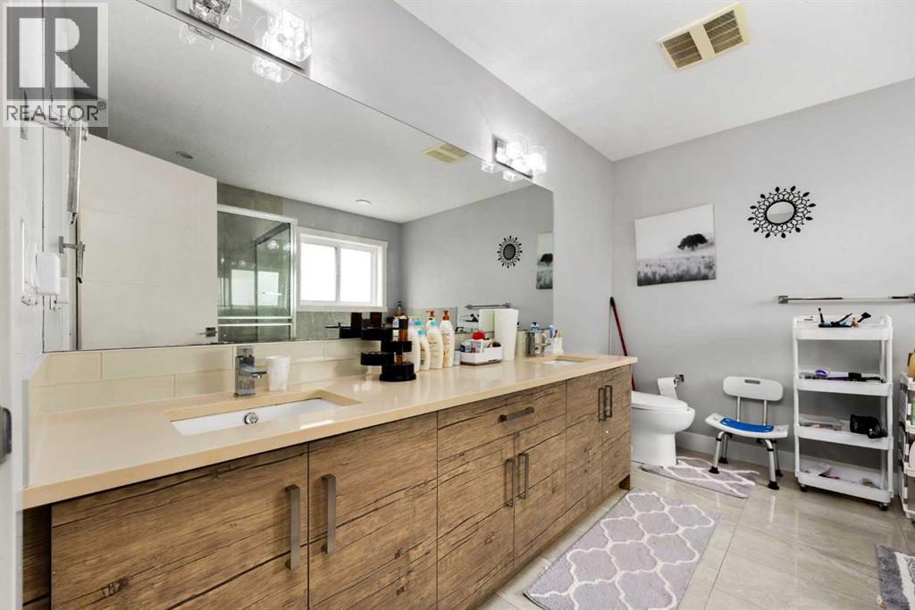 106 Baysprings Gardens Sw, Airdrie, Alberta  T4B 5C6 - Photo 22 - A2267686