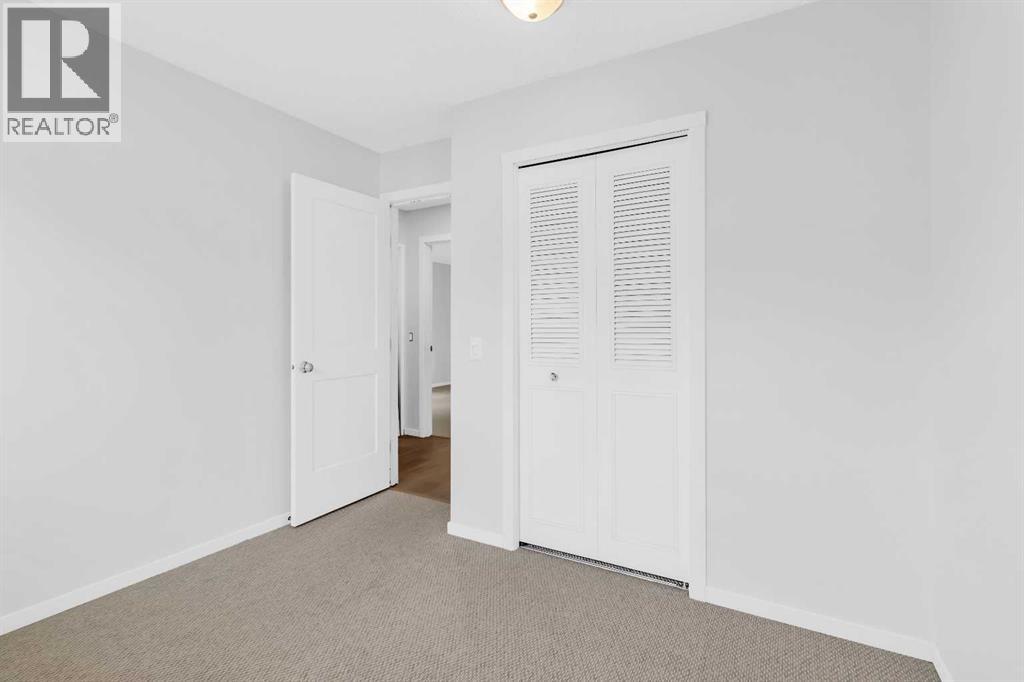 968 Bracewood Rise Sw, Calgary, Alberta  T2W 3C9 - Photo 14 - A2268511