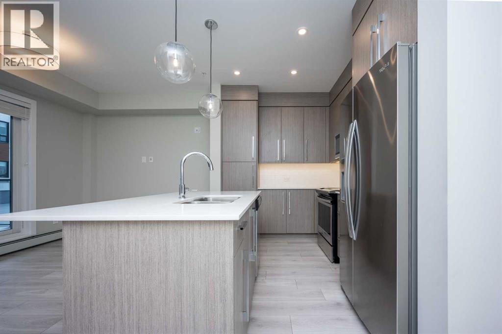 217, 383 Smith Street Nw, Calgary, Alberta  T3B 6J9 - Photo 2 - A2227083