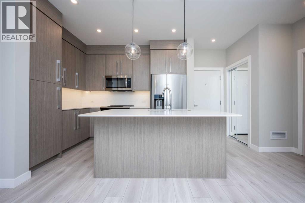 217, 383 Smith Street Nw, Calgary, Alberta  T3B 6J9 - Photo 5 - A2227083