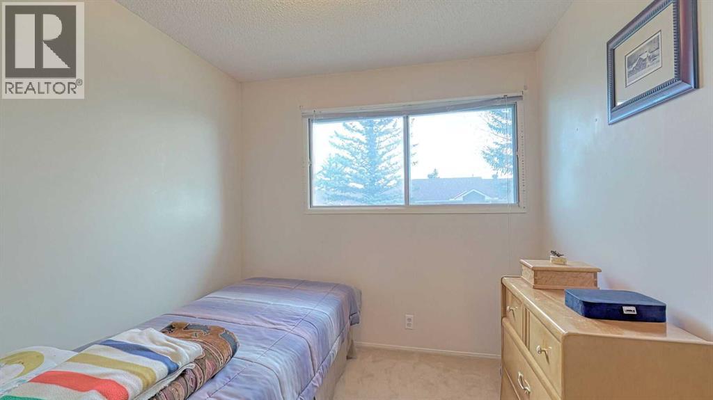 135 Woodsman Lane Sw, Calgary, Alberta  T2W 4Z5 - Photo 20 - A2262352