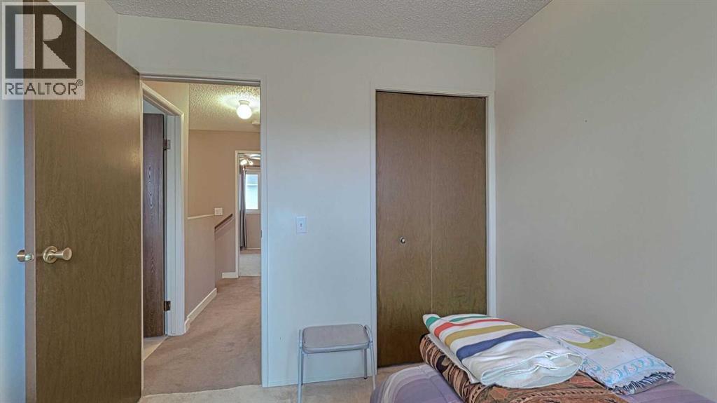 135 Woodsman Lane Sw, Calgary, Alberta  T2W 4Z5 - Photo 21 - A2262352