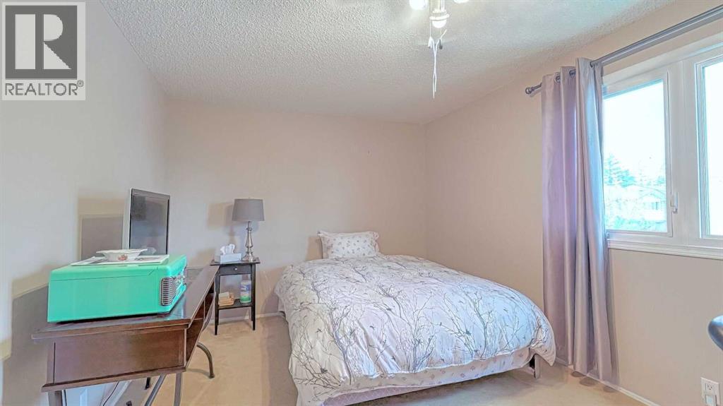 135 Woodsman Lane Sw, Calgary, Alberta  T2W 4Z5 - Photo 17 - A2262352