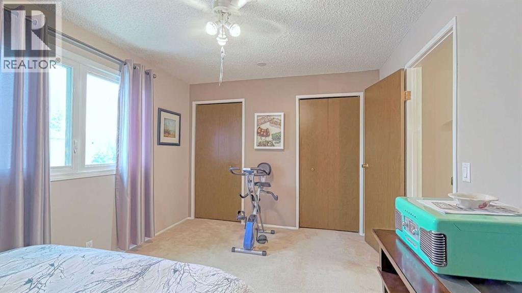 135 Woodsman Lane Sw, Calgary, Alberta  T2W 4Z5 - Photo 18 - A2262352