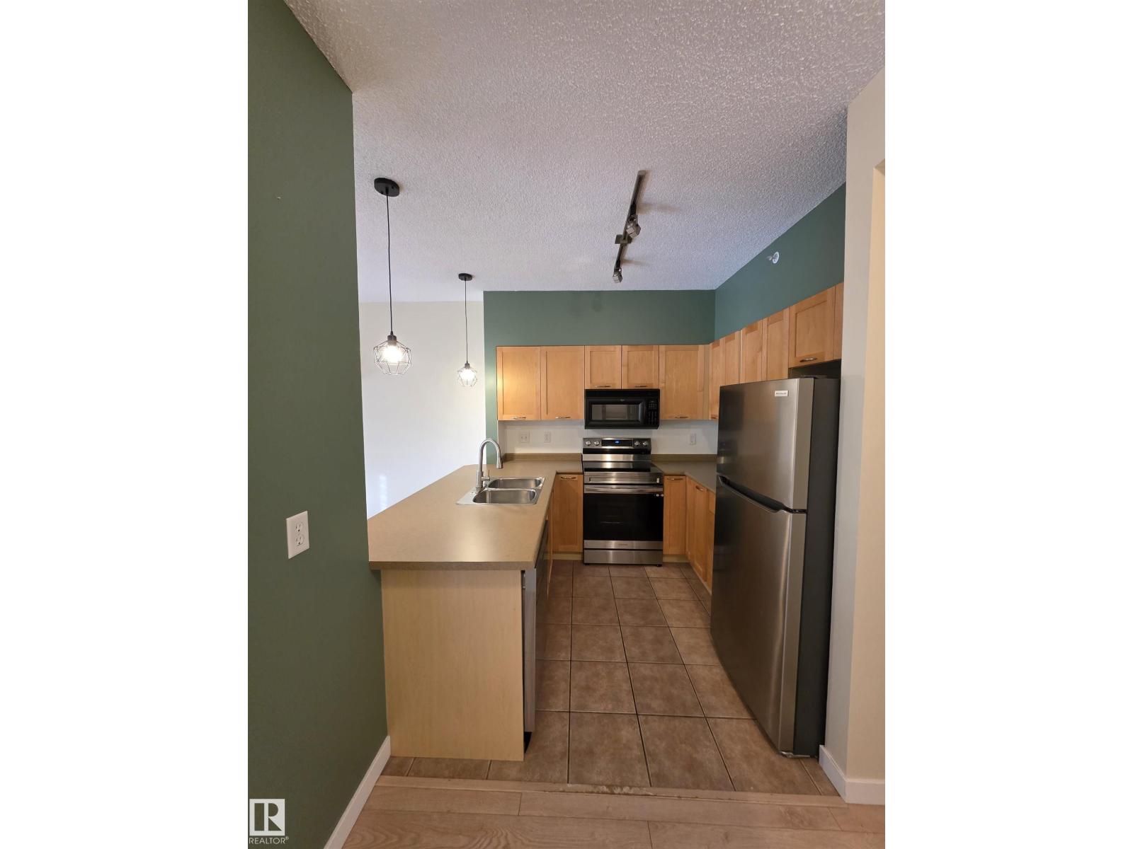 ##2-105 4245 139 Av Nw Nw, Edmonton, Alberta  T5Y 3E8 - Photo 6 - E4464590