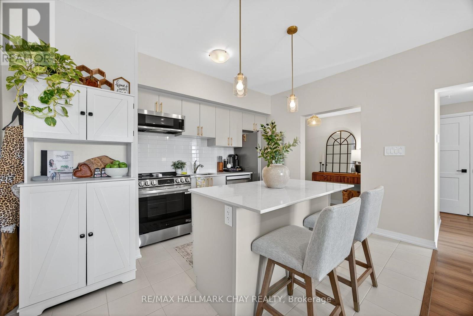 203 - 15 Kneeshaw Drive, Barrie (Innis-Shore), Ontario  L9J 0J8 - Photo 7 - S12505294