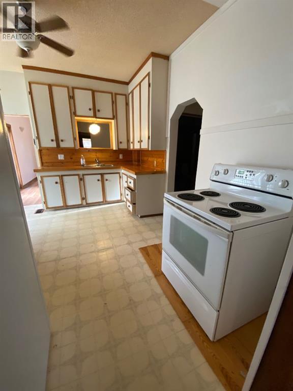 663 11 Avenue, Carstairs, Alberta  T0M 0N0 - Photo 17 - A2268222