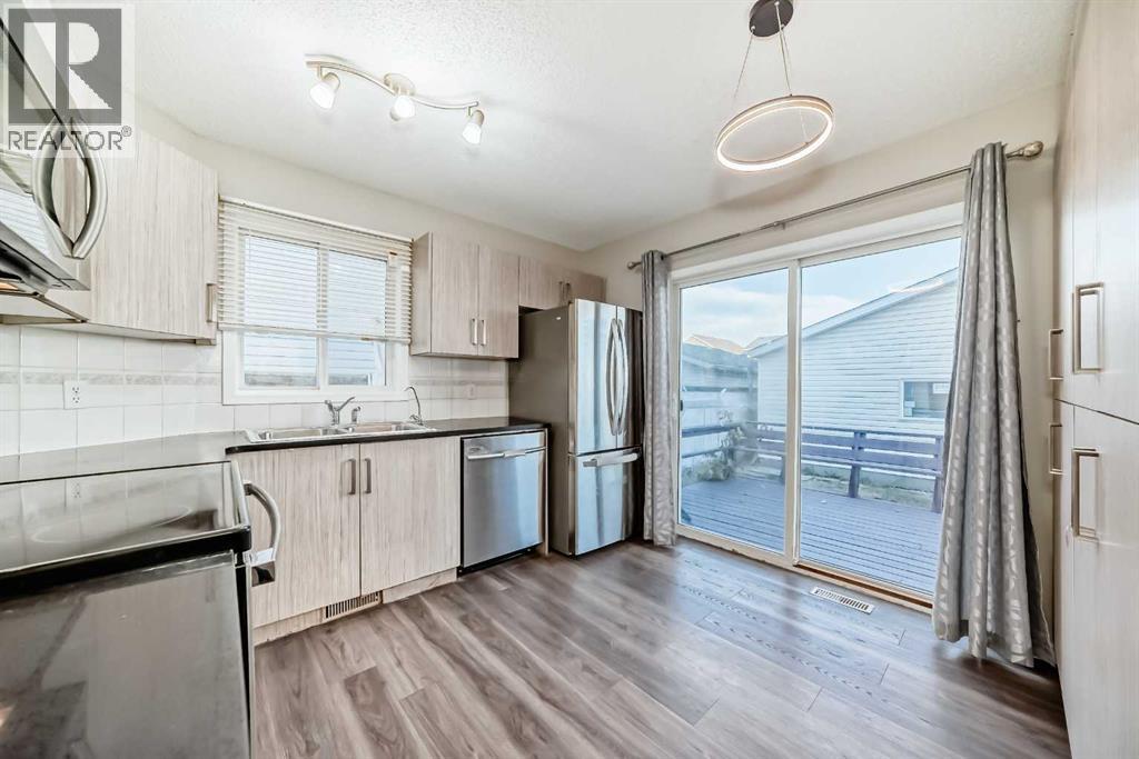 121 Martin Crossing Manor Ne, Calgary, Alberta  T3J 3S3 - Photo 7 - A2268135