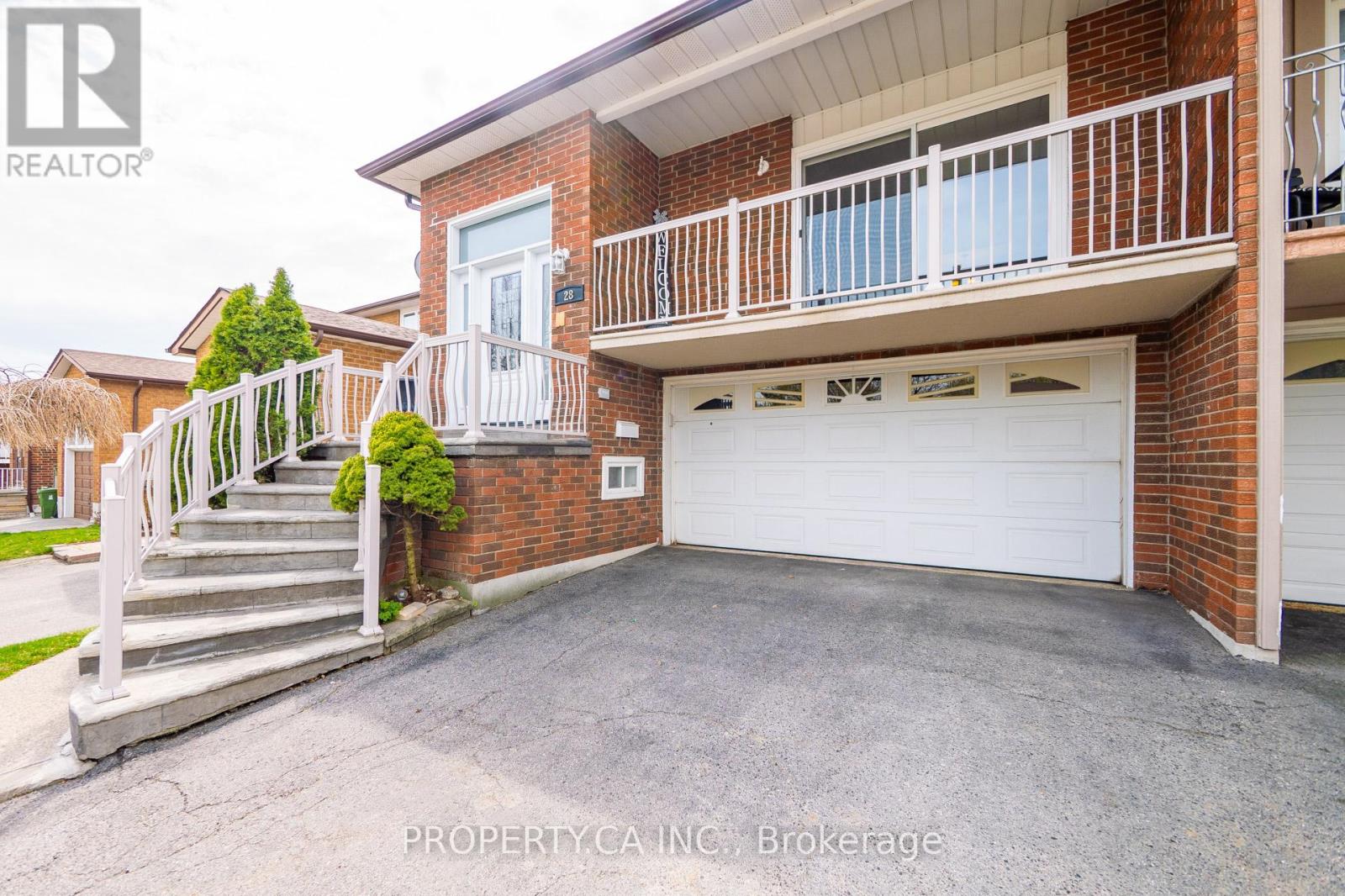 28 Clubhouse Court, Toronto, Ontario  M3L 2K5 - Photo 2 - W12505480