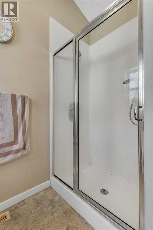 119 Valley Stream Circle Nw, Calgary, Alberta  T3B 5W2 - Photo 30 - A2259449