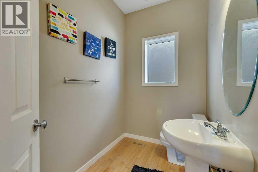 119 Valley Stream Circle Nw, Calgary, Alberta  T3B 5W2 - Photo 4 - A2259449