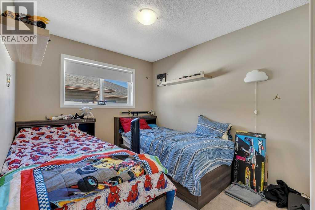 119 Valley Stream Circle Nw, Calgary, Alberta  T3B 5W2 - Photo 20 - A2259449
