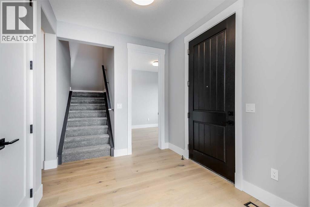 1209 Coopers Drive Sw, Airdrie, Alberta  T4B 3T6 - Photo 4 - A2257477